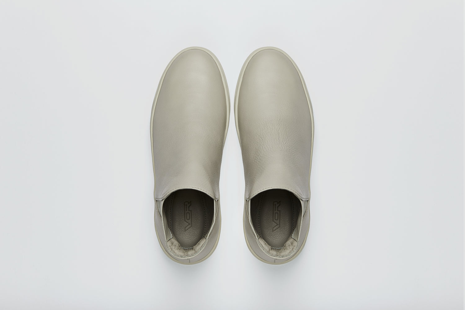 A minimalist and elegant sneaker with a buttery soft calfskin lining.