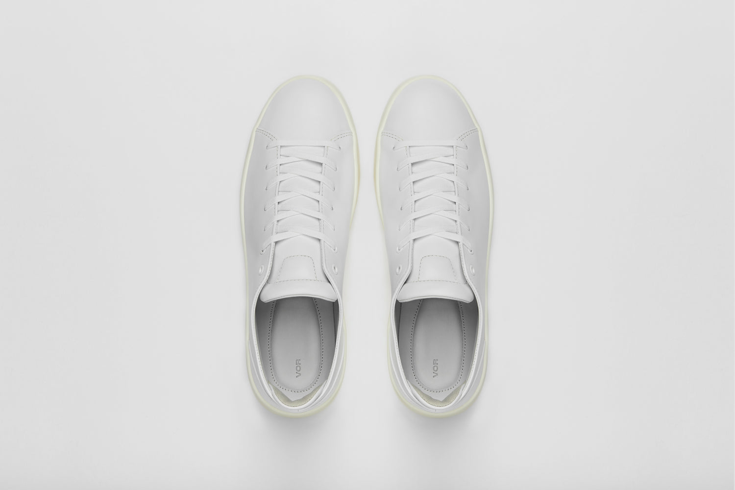 Classic white sneaker made from premium materials and leathers.