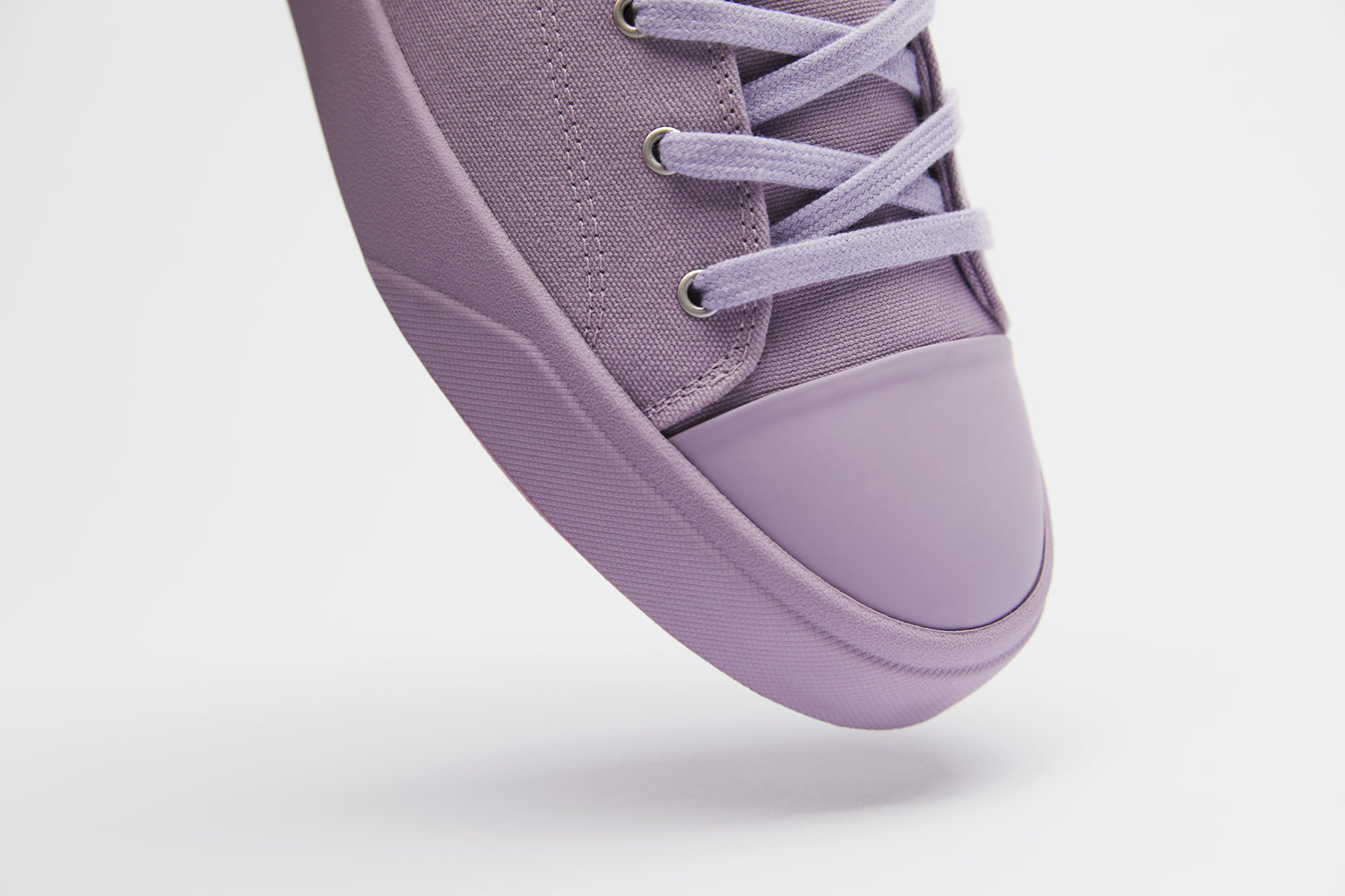 Vibrant lilac summer shoe made from premium materials.