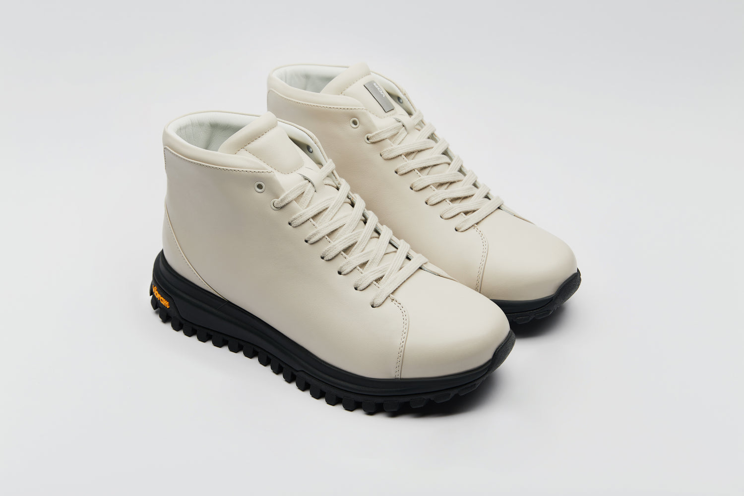 Premium high top sneaker, with high quality leathers in beige.