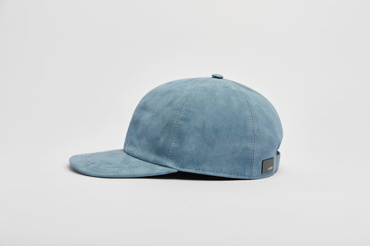 Elegant, handmade cap with luxurious blue nubuck leather.