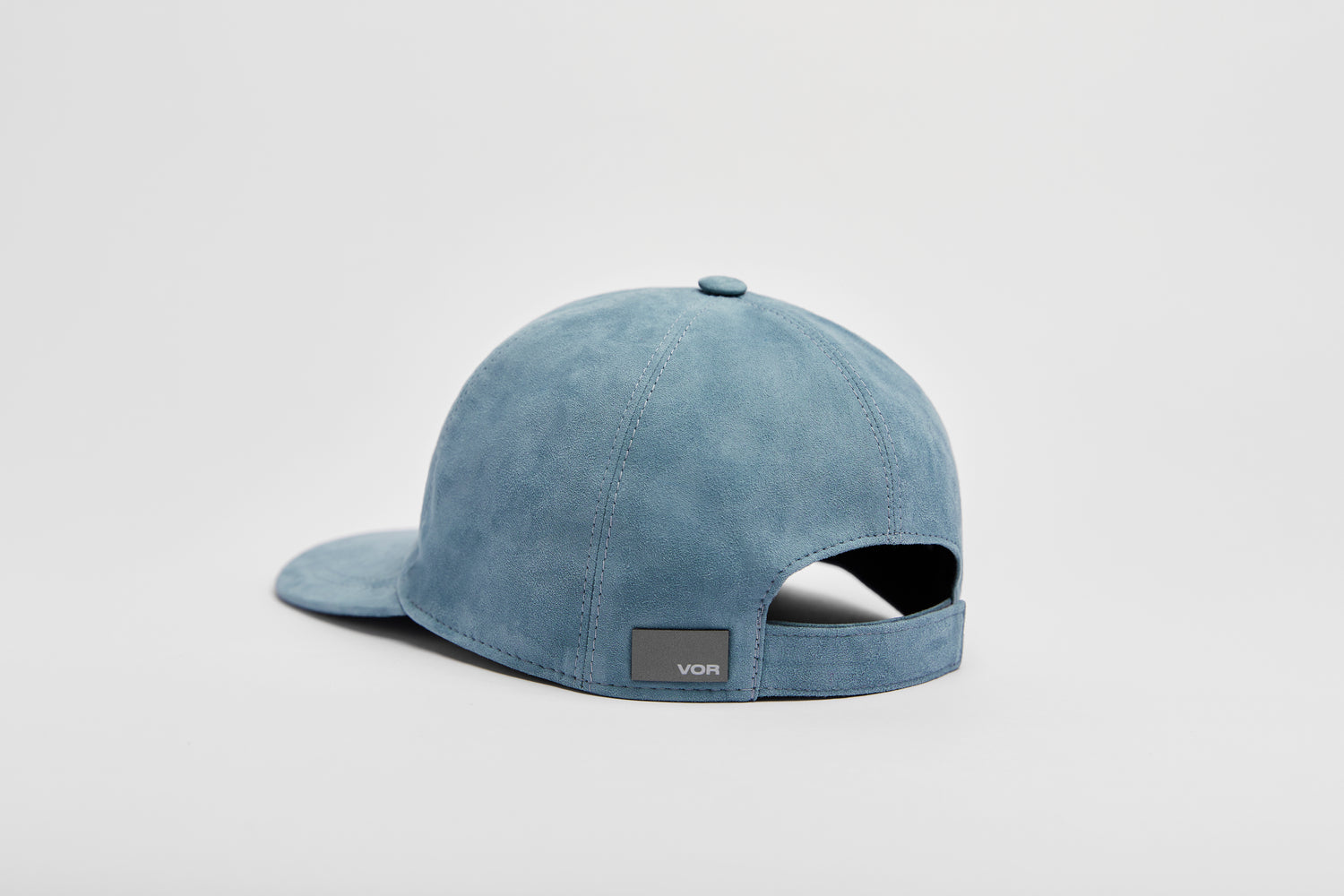 Modern cap, with premium blue nubuck leather.