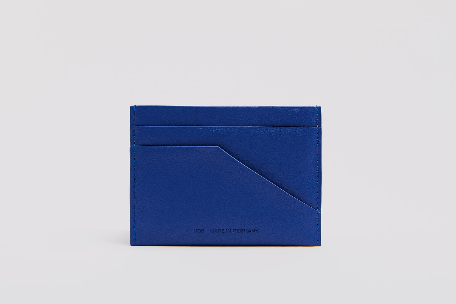 High quality leather cardholder in a vibrant shade of blue.
