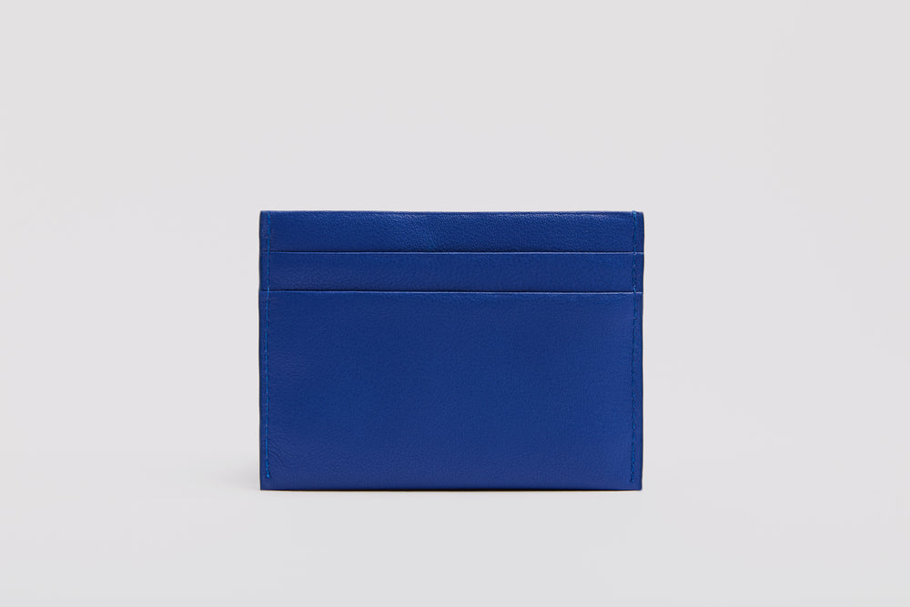 Vibrant blue cardholder made from premium full grain leather.