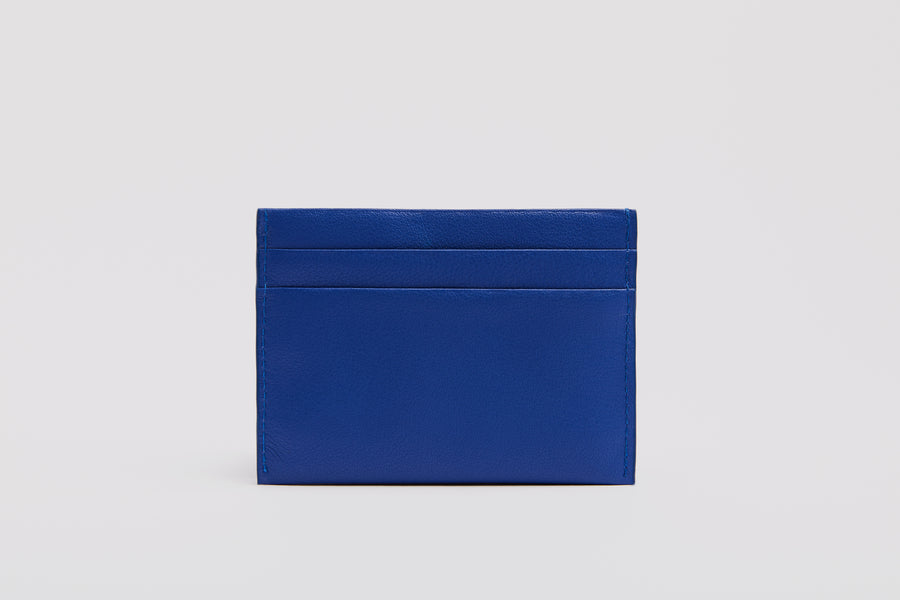 Vibrant blue cardholder made from premium full grain leather.