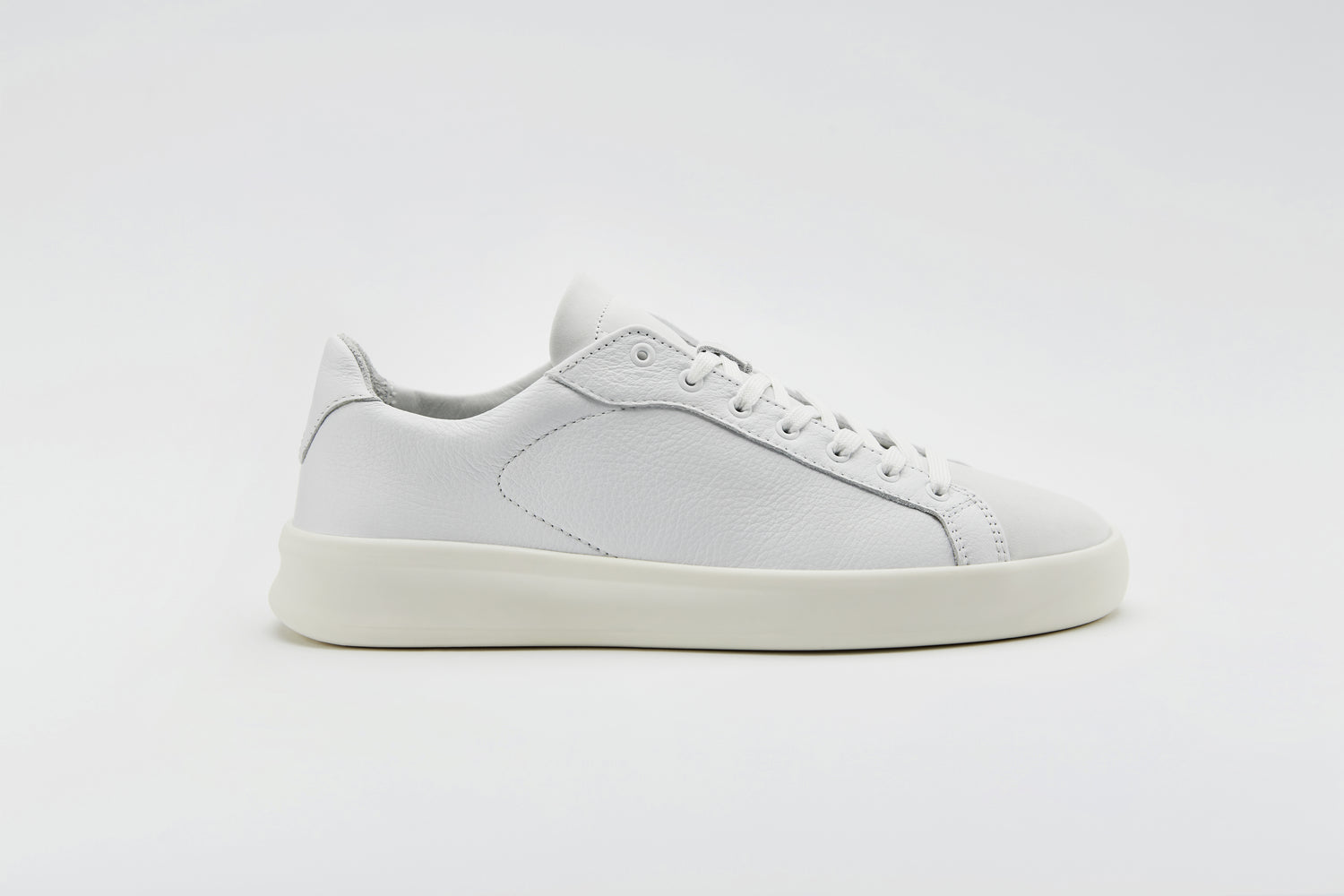 White full grain tumbled leather sneaker with nubuck leather panels.