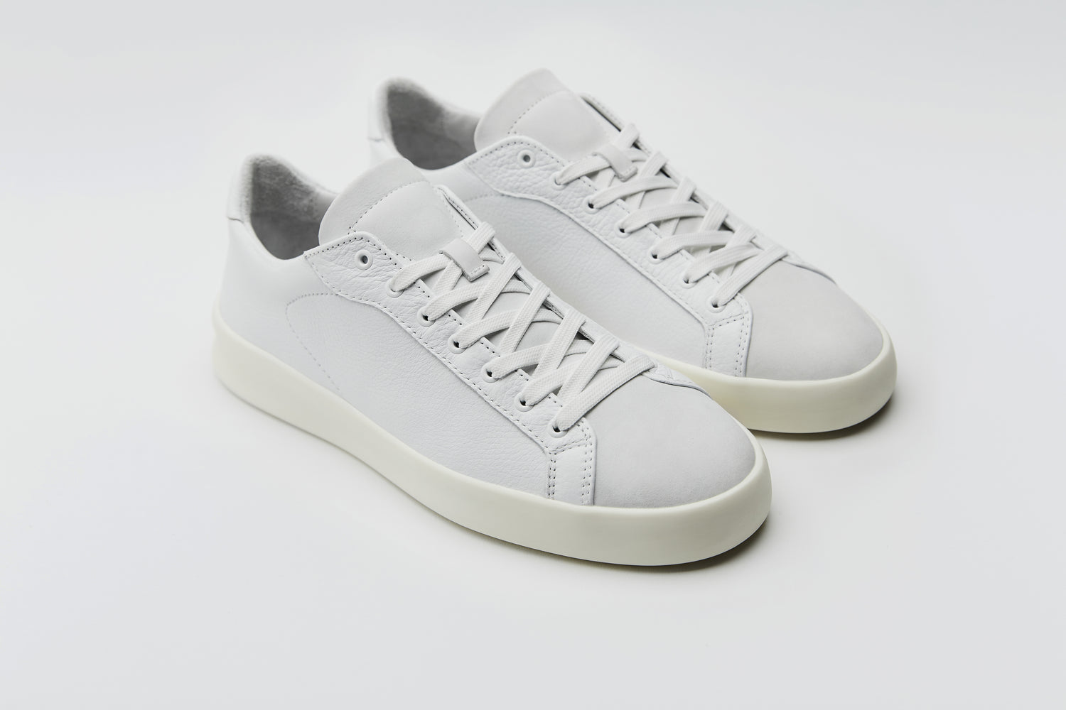 Premium white sneaker made from high quality leathers and materials.